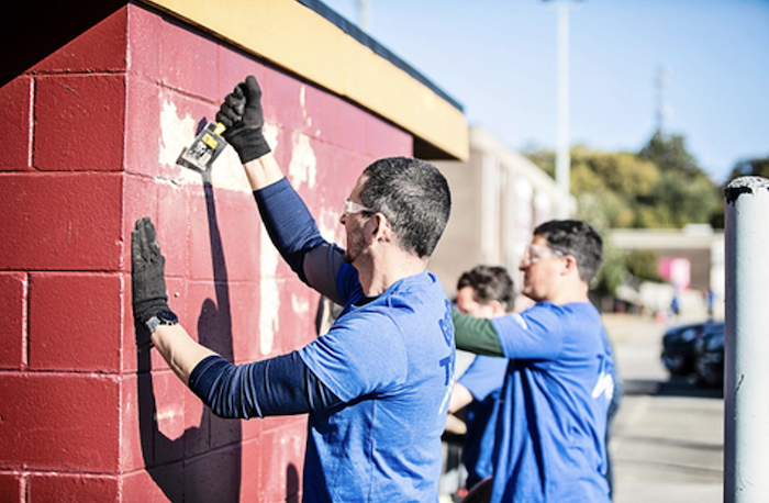 volunteers building