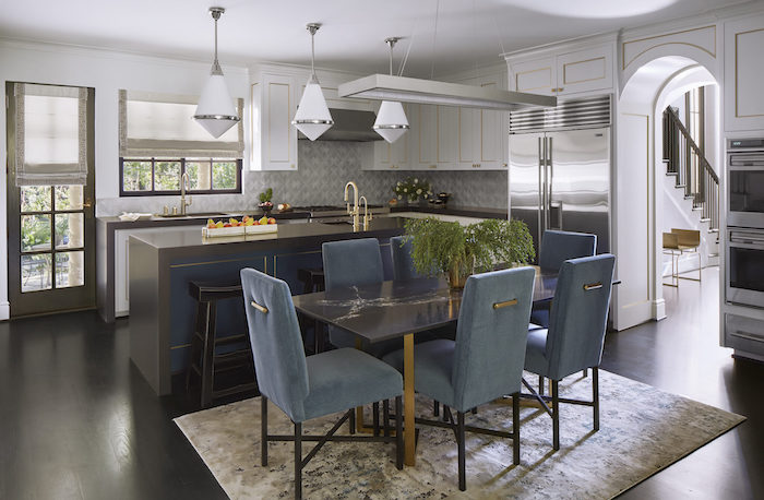 blue velvet dining chairs in a kitchen